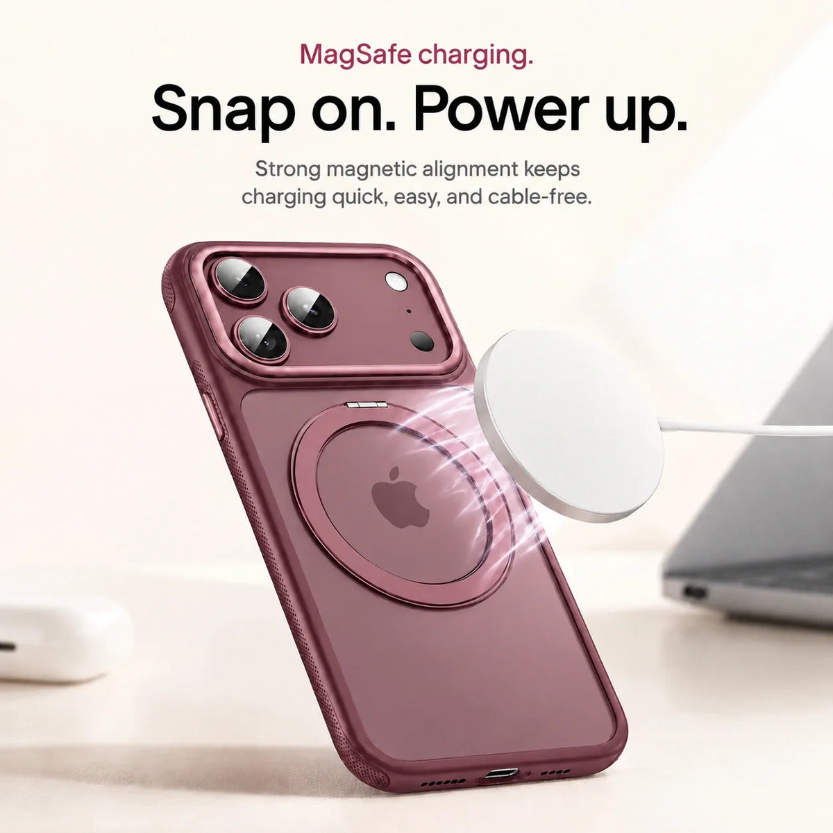 Burgundy clear phone case beside a magnetic wireless charging puck #color_Burgundy