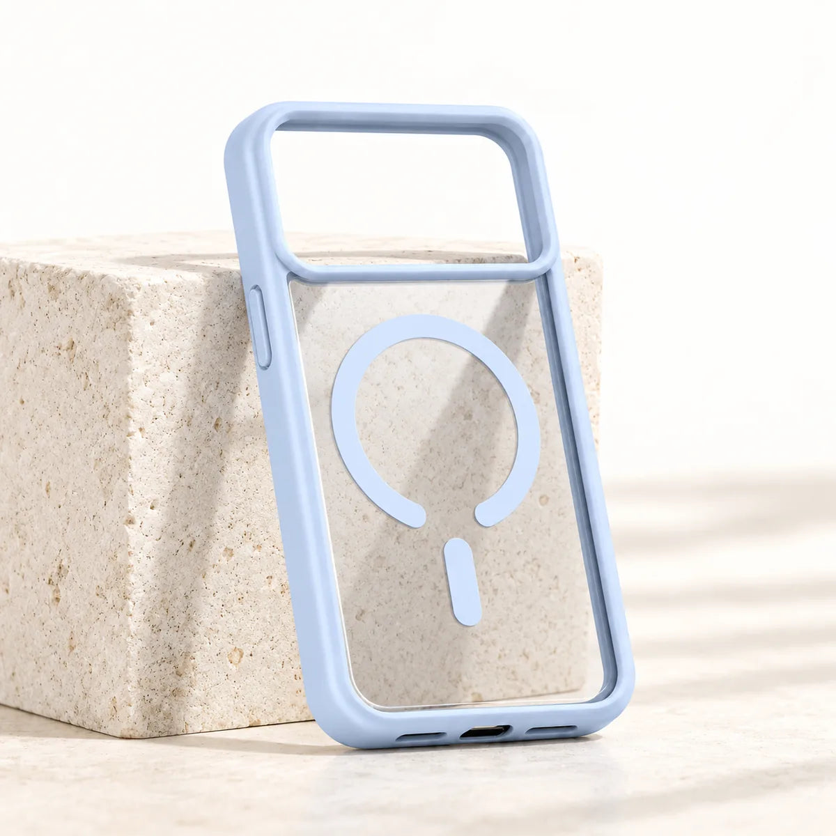 Empty light blue phone case showing a clear back and an open magnetic ring.