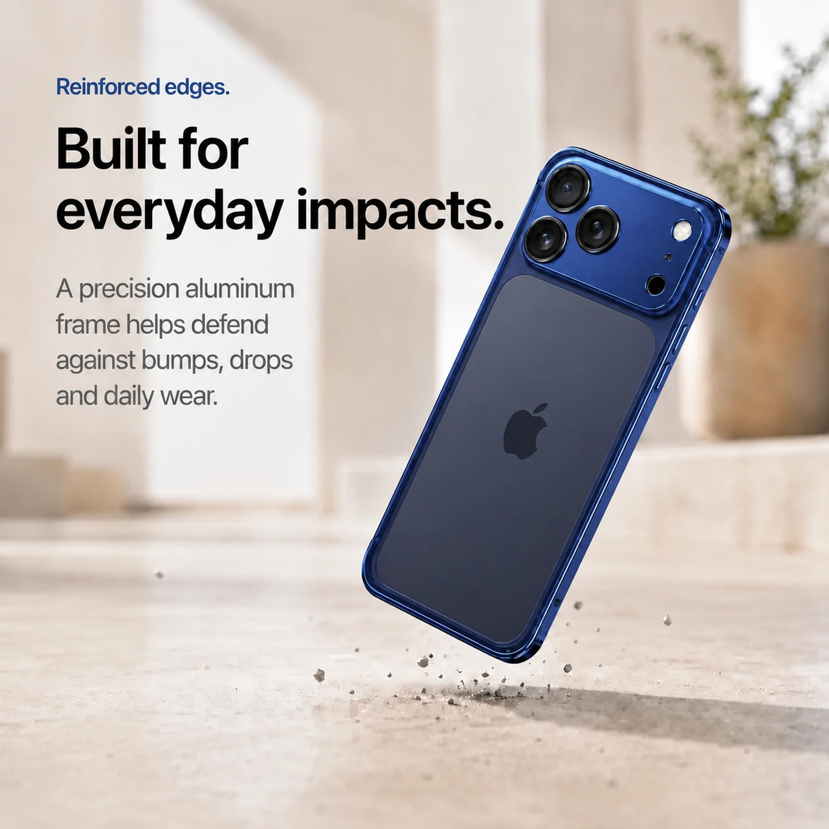 Deep blue aluminum frame phone case demonstrating its reinforced frame during a drop #color_Deep Blue