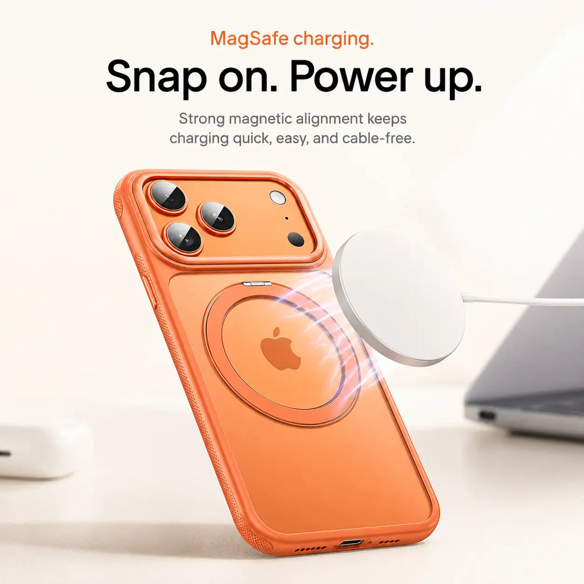 Orange magnetic phone case aligned with a white wireless charging puck #color_Cosmic Orange